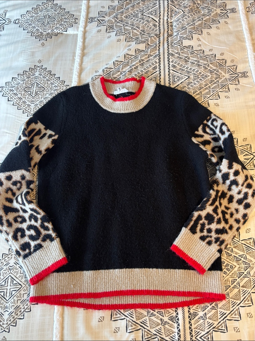 THML Black Crewneck Sweater with Leopard-Print Sleeves and Red Trim
